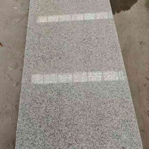 河池芝麻白光面毛板